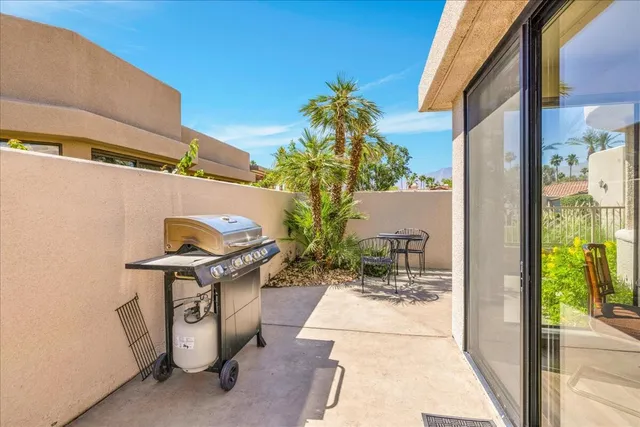 a view of a street with sitting area