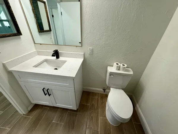 a bathroom with a sink and a toilet