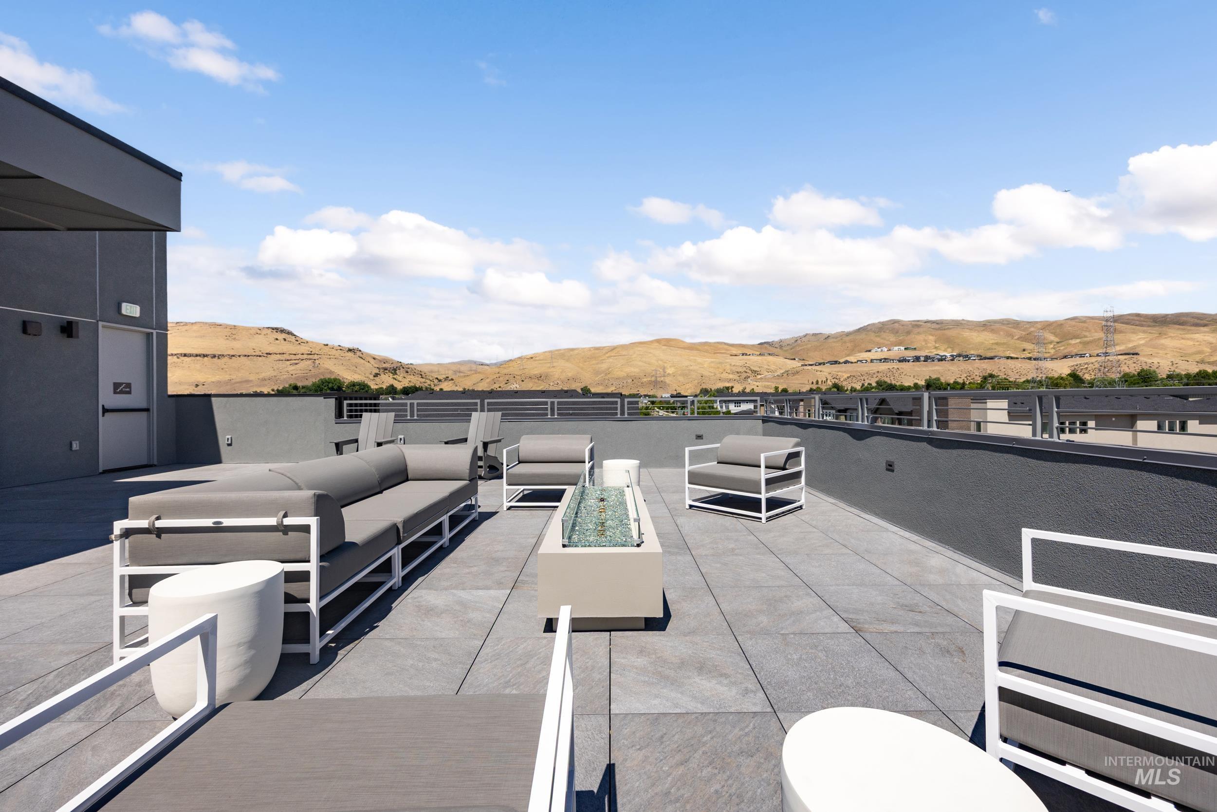 4340 East Haystack Street, Unit 307 Boise, ID 83716 - Photo 37 of 50 View of patio / terrace with a mountain view and an outdoor living space