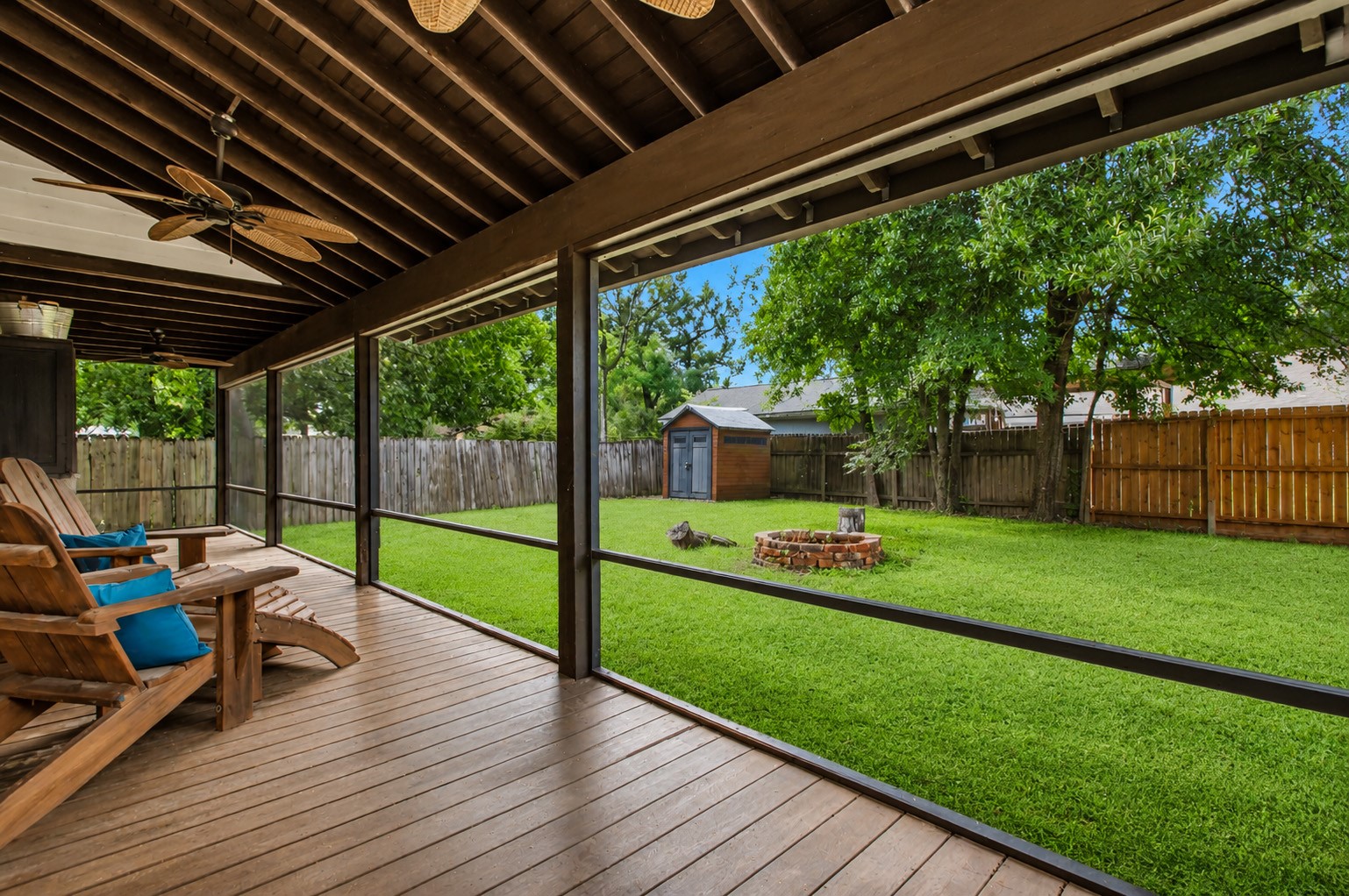 312 Springwood Drive Conroe, TX 77385 - Photo 43 of 50 The 3 fans in the screened in back patio provides the much needed breeze on hot summer days.