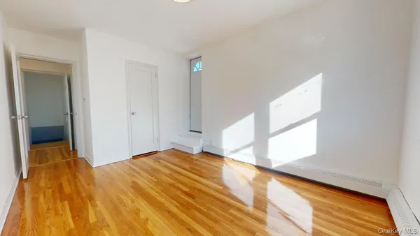 a view of an empty room and window