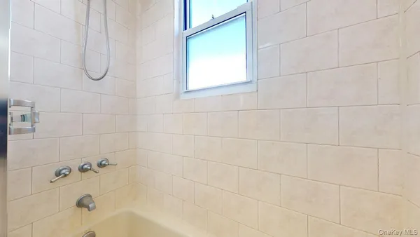 a bathroom with a bathtub