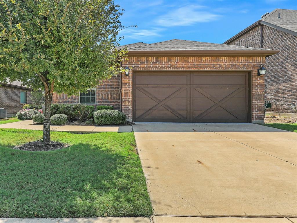 1520 Summit View Lane Little Elm, TX 76227 - Photo 2 of 25 a front view of a house with a yard