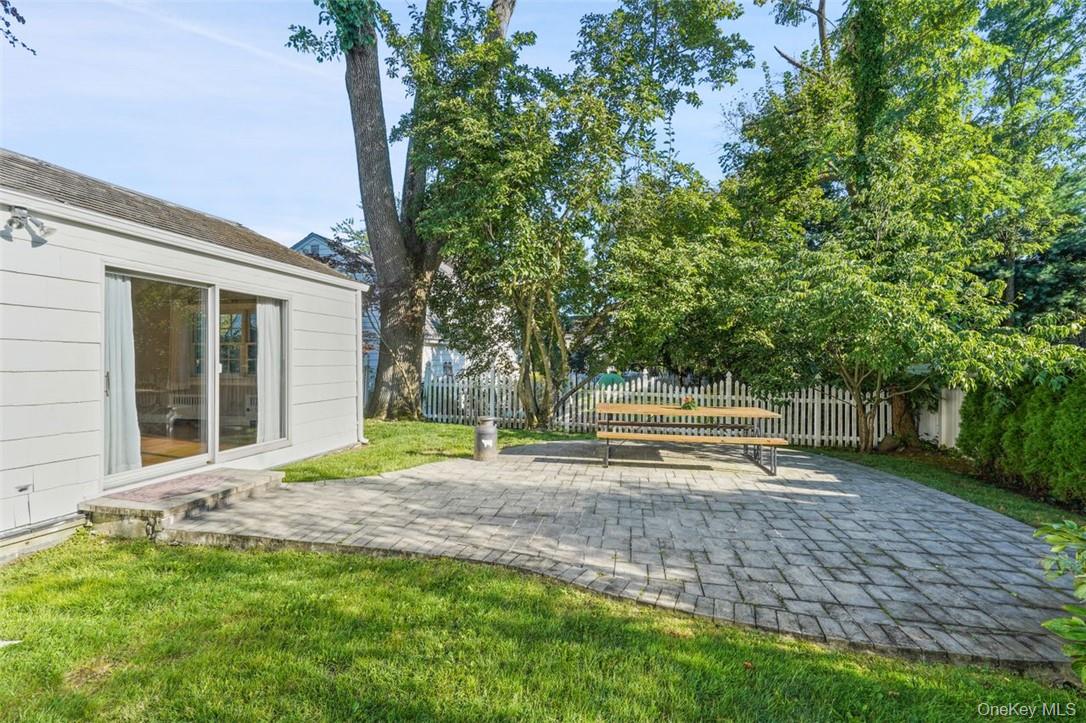 246 Mamaroneck Road Scarsdale, NY 10583 - Photo 10 of 35 View of yard featuring a patio