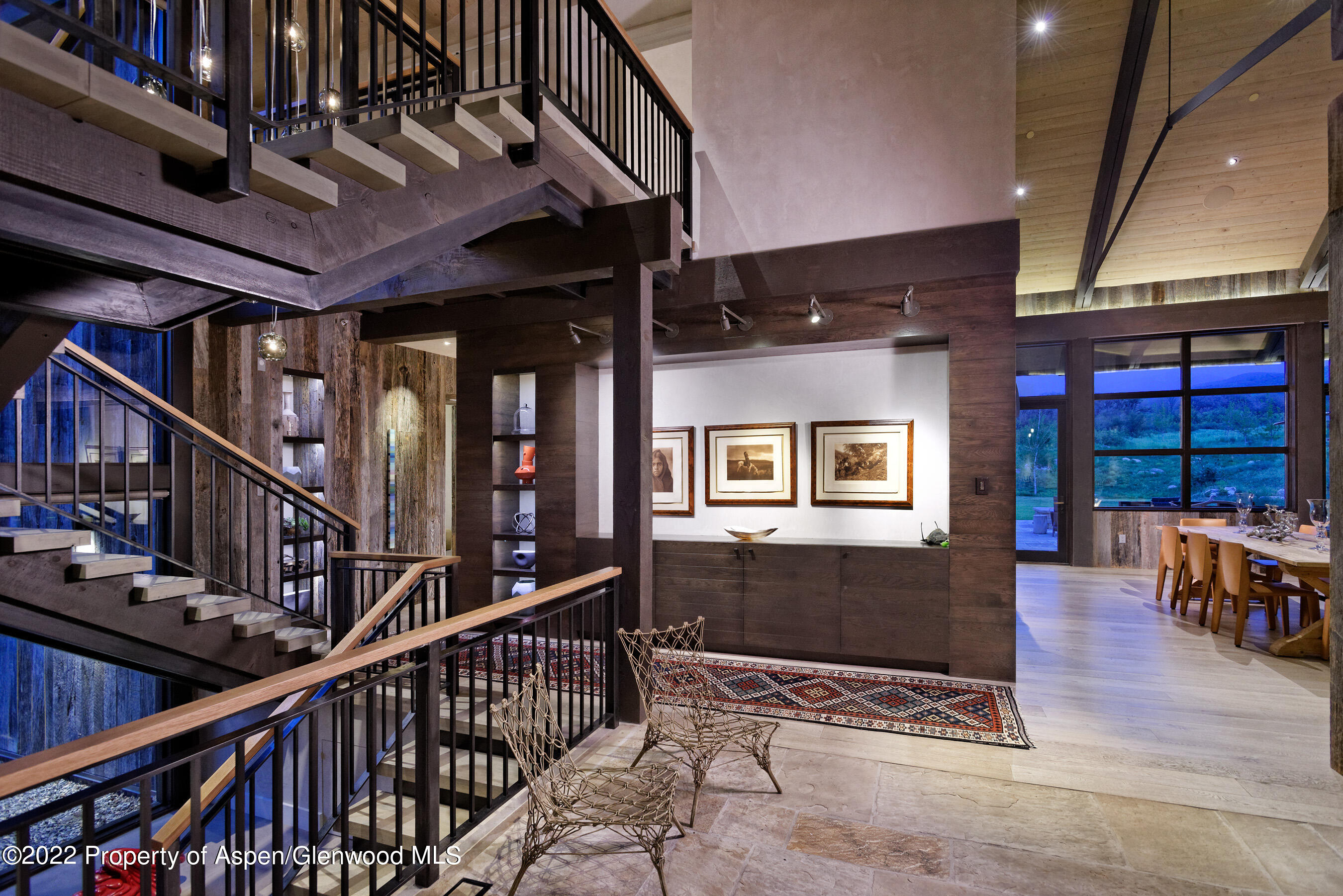 3500 Snowmass Creek Road Snowmass, CO 81654 - Photo 11 of 64 a view of staircase with a rug and a window
