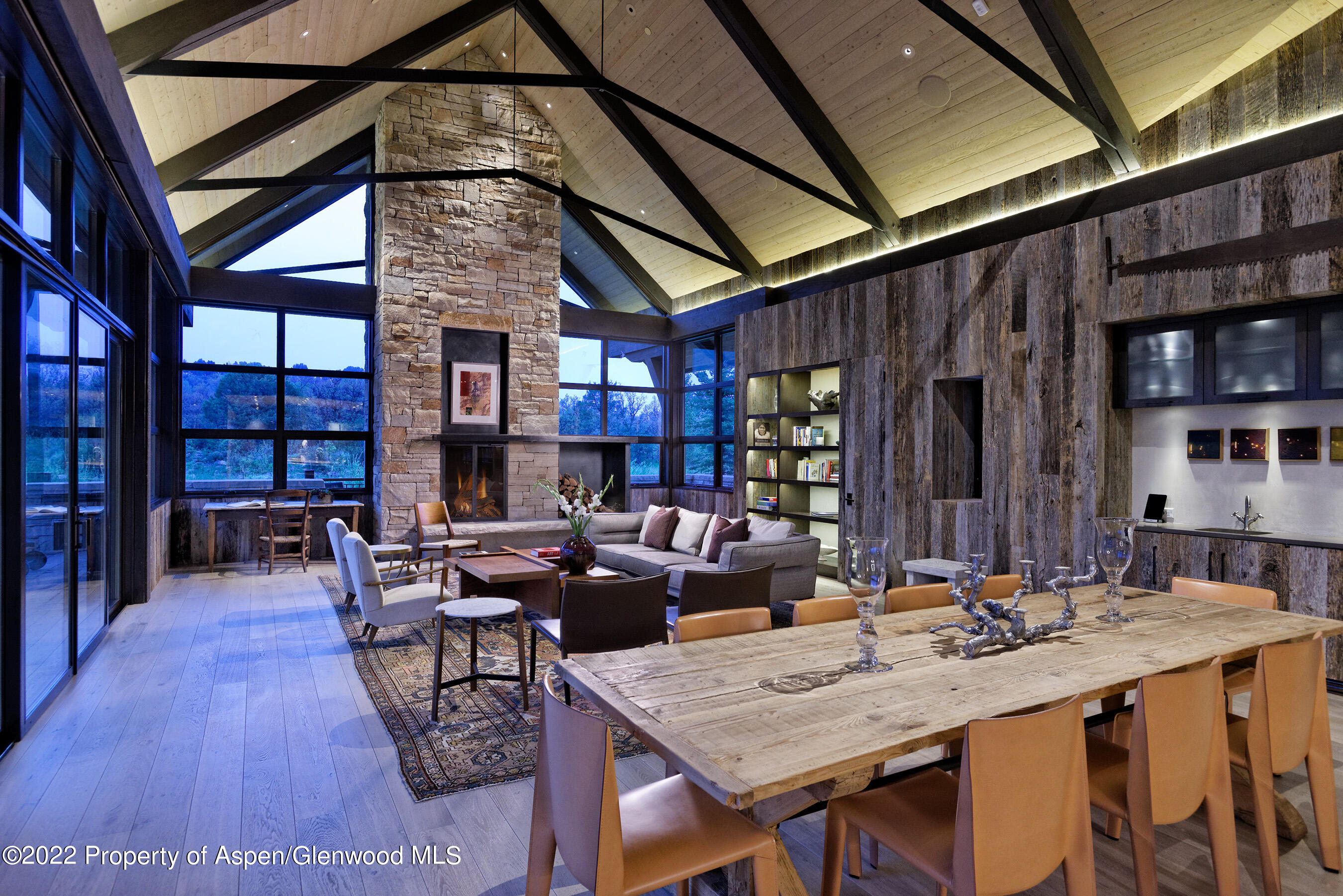 3500 Snowmass Creek Road Snowmass, CO 81654 - Photo 13 of 64 a living room with fireplace furniture and a rug