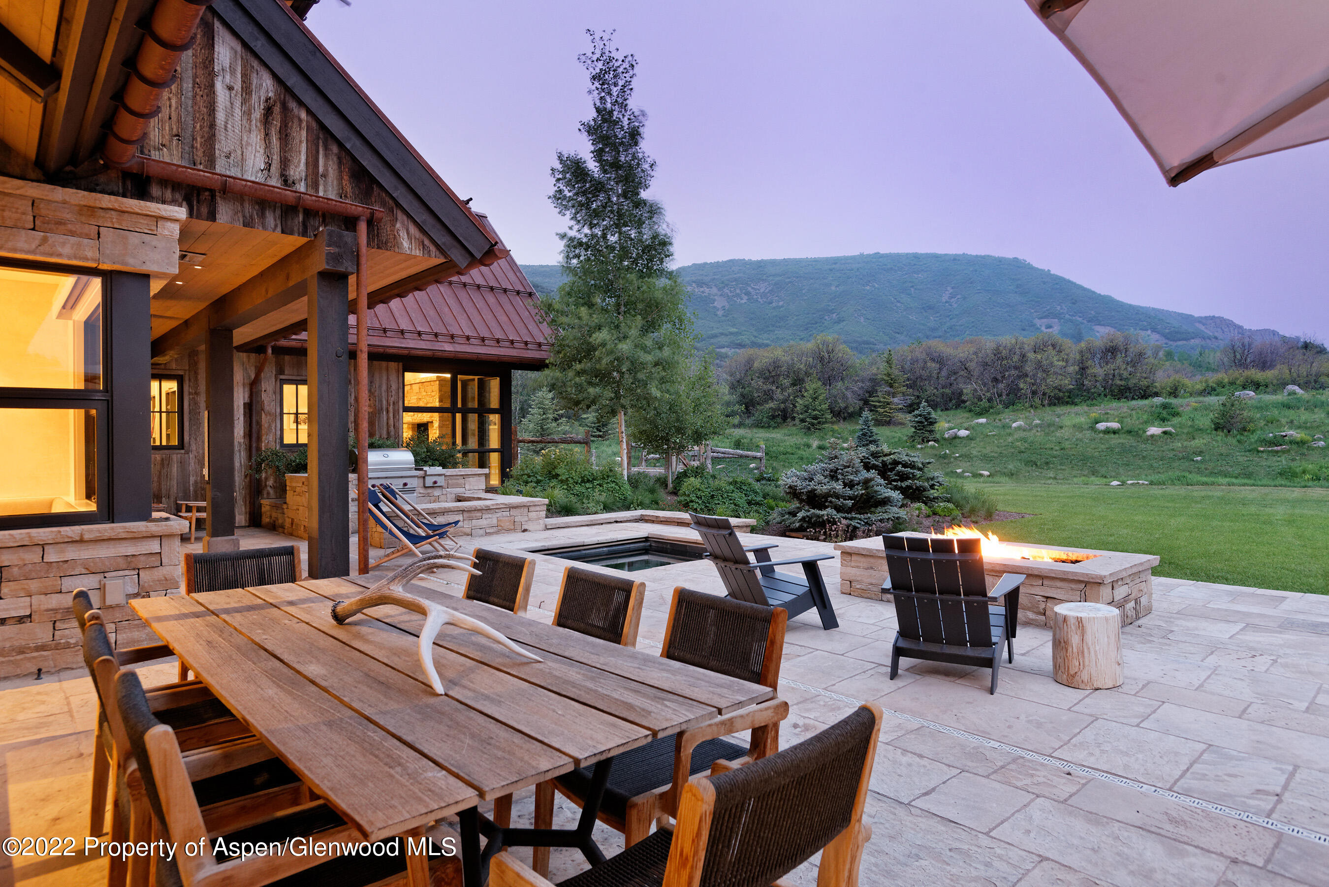 3500 Snowmass Creek Road Snowmass, CO 81654 - Photo 19 of 64 a view of a patio with table and chairs and couches