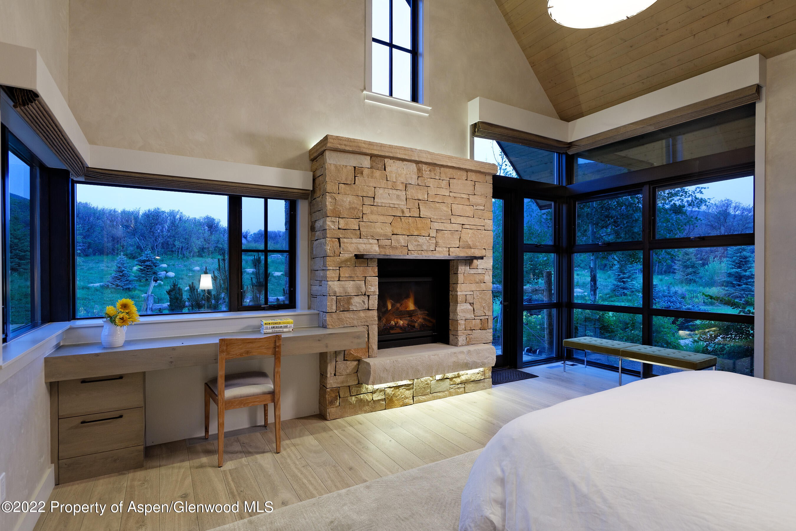 3500 Snowmass Creek Road Snowmass, CO 81654 - Photo 23 of 64 a living room with a couch and a fireplace