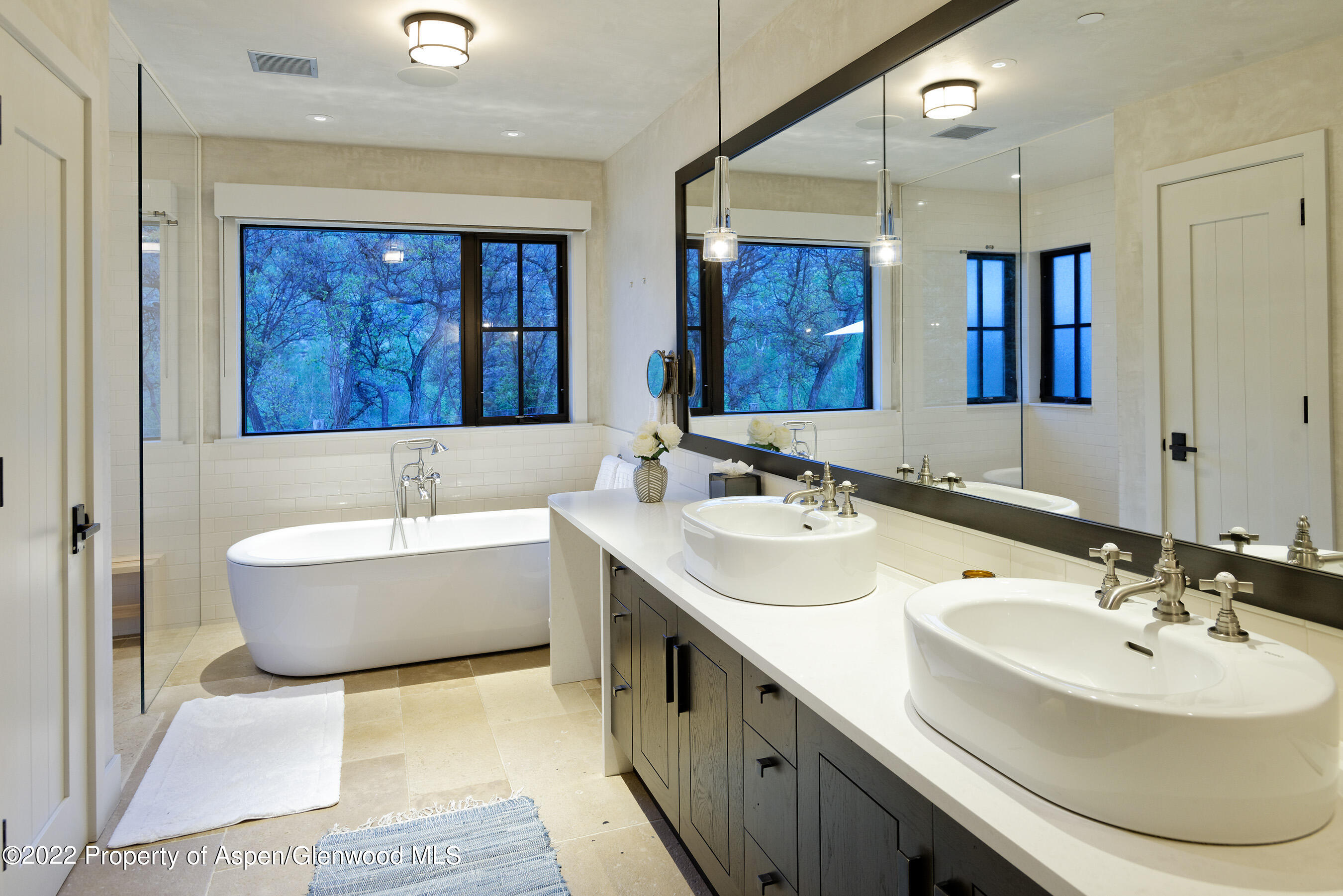 3500 Snowmass Creek Road Snowmass, CO 81654 - Photo 24 of 64 a bathroom with a double vanity sink mirror and bathtub