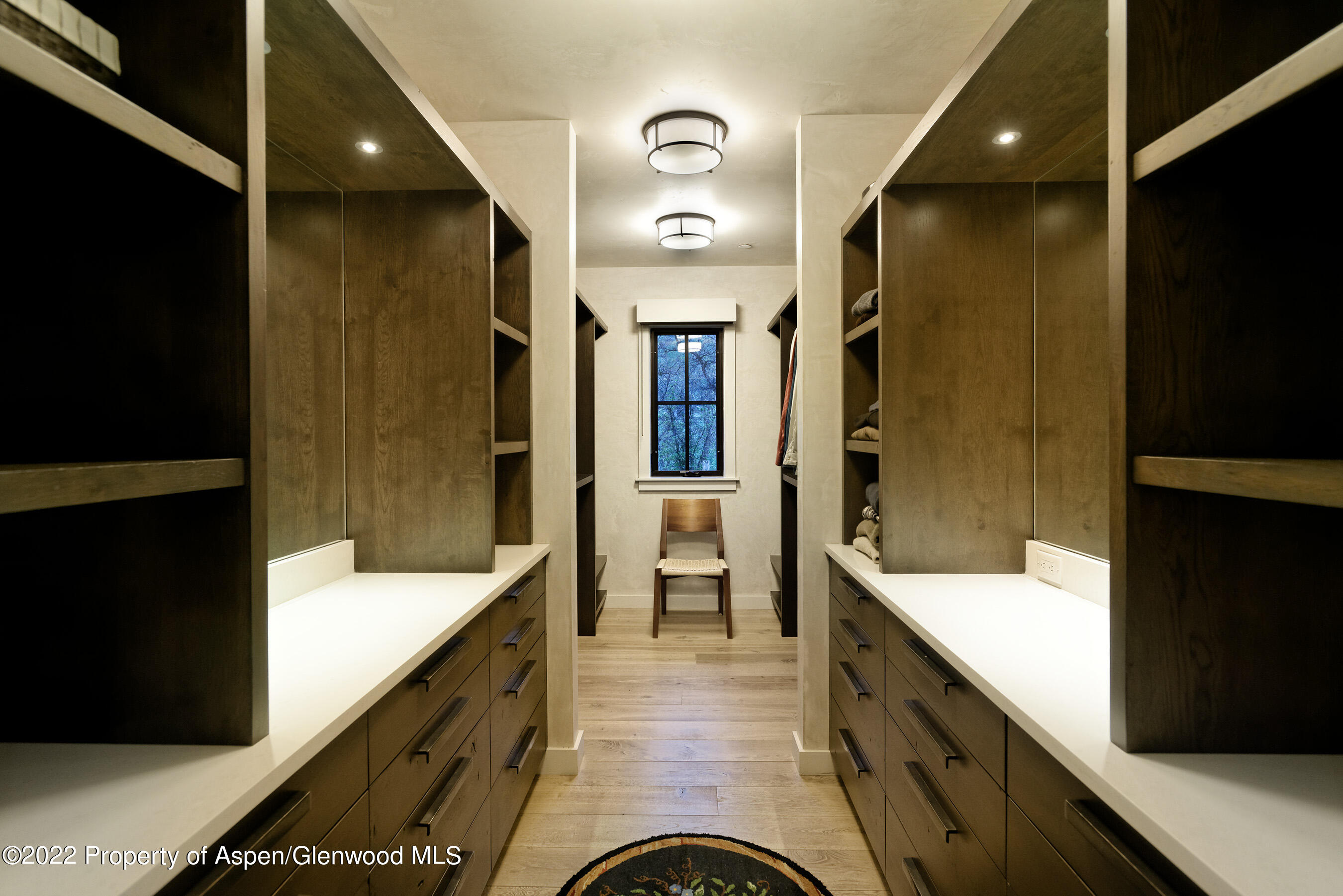 3500 Snowmass Creek Road Snowmass, CO 81654 - Photo 25 of 64 a bathroom with a double vanity sink a toilet and shower