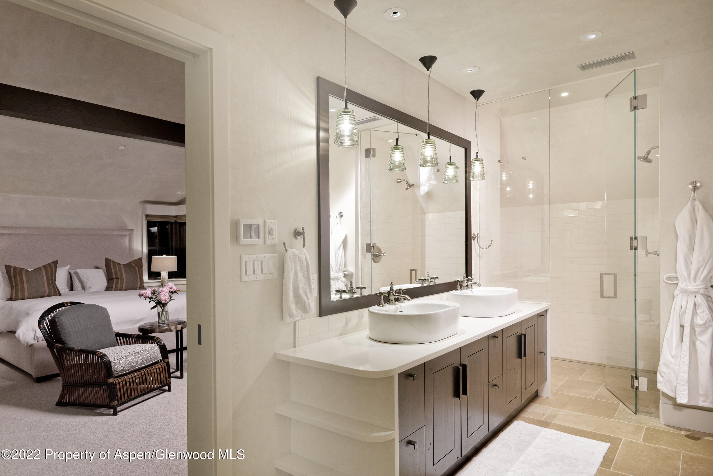 3500 Snowmass Creek Road Snowmass, CO 81654 - Photo 28 of 64 a bathroom with a sink double vanity and a mirror