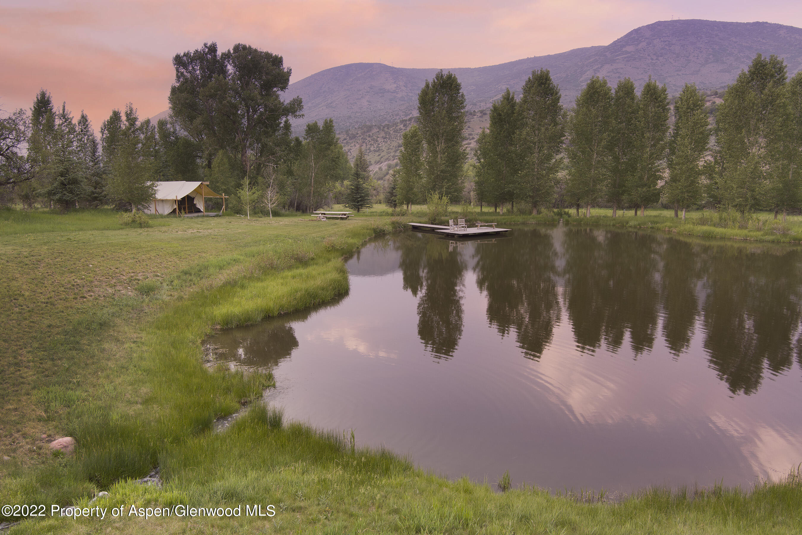 3500 Snowmass Creek Road Snowmass, CO 81654 - Photo 41 of 64 Pond, Dock and Safari Tent at Sunset