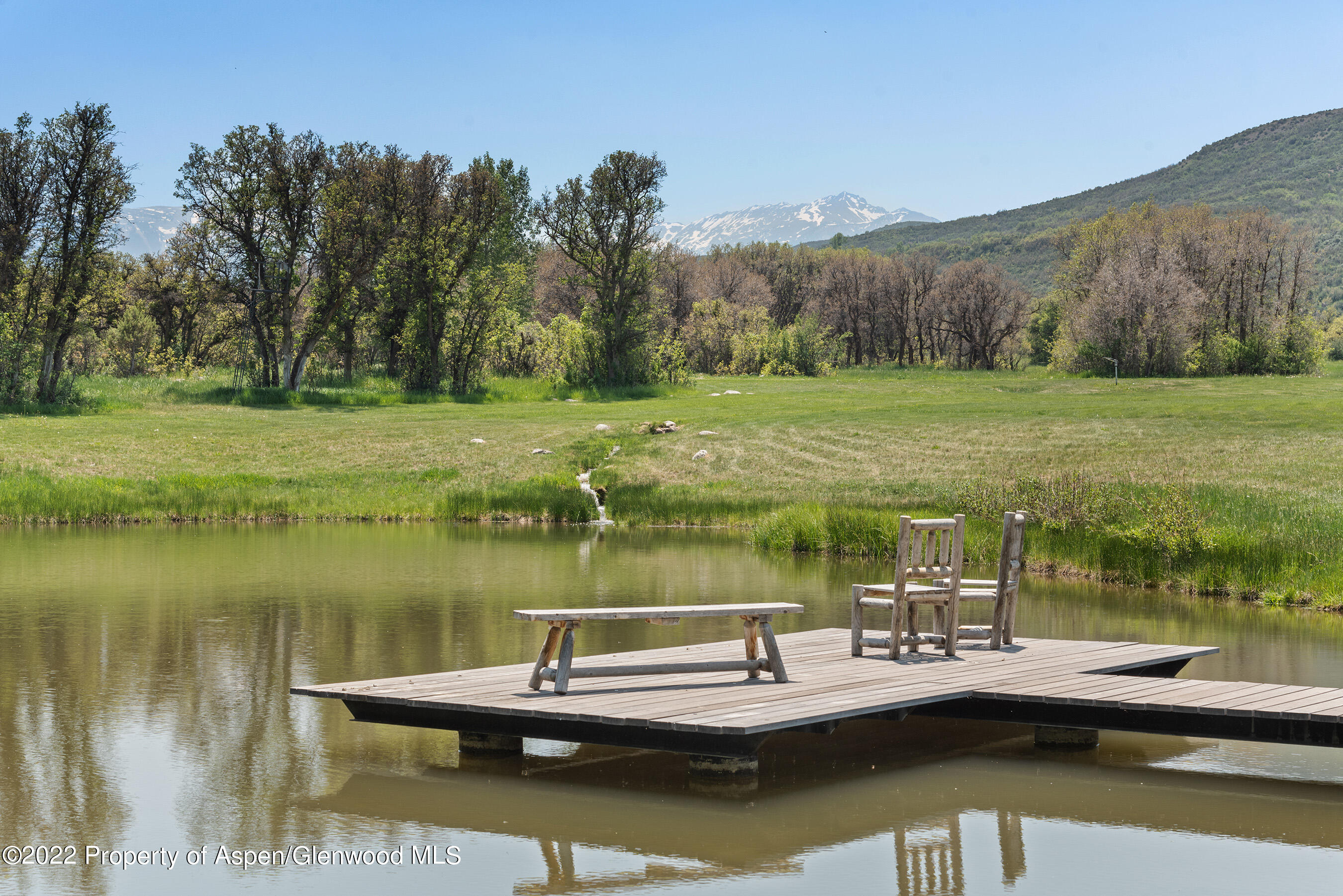 3500 Snowmass Creek Road Snowmass, CO 81654 - Photo 43 of 64 a view of a lake with a mountain
