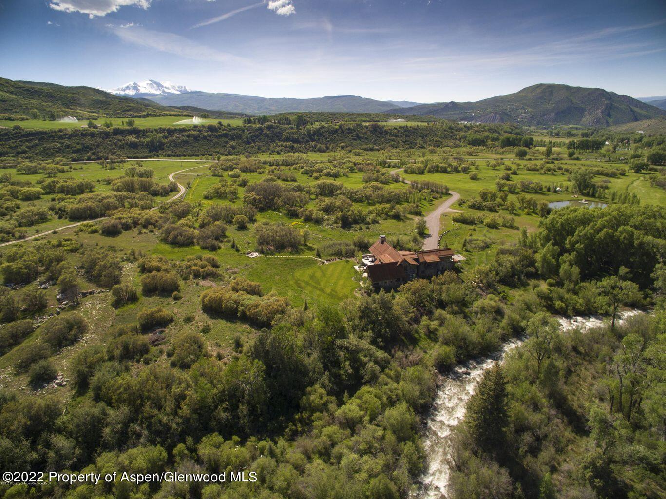 3500 Snowmass Creek Road Snowmass, CO 81654 - Photo 62 of 64 a view of a city with mountains in the background