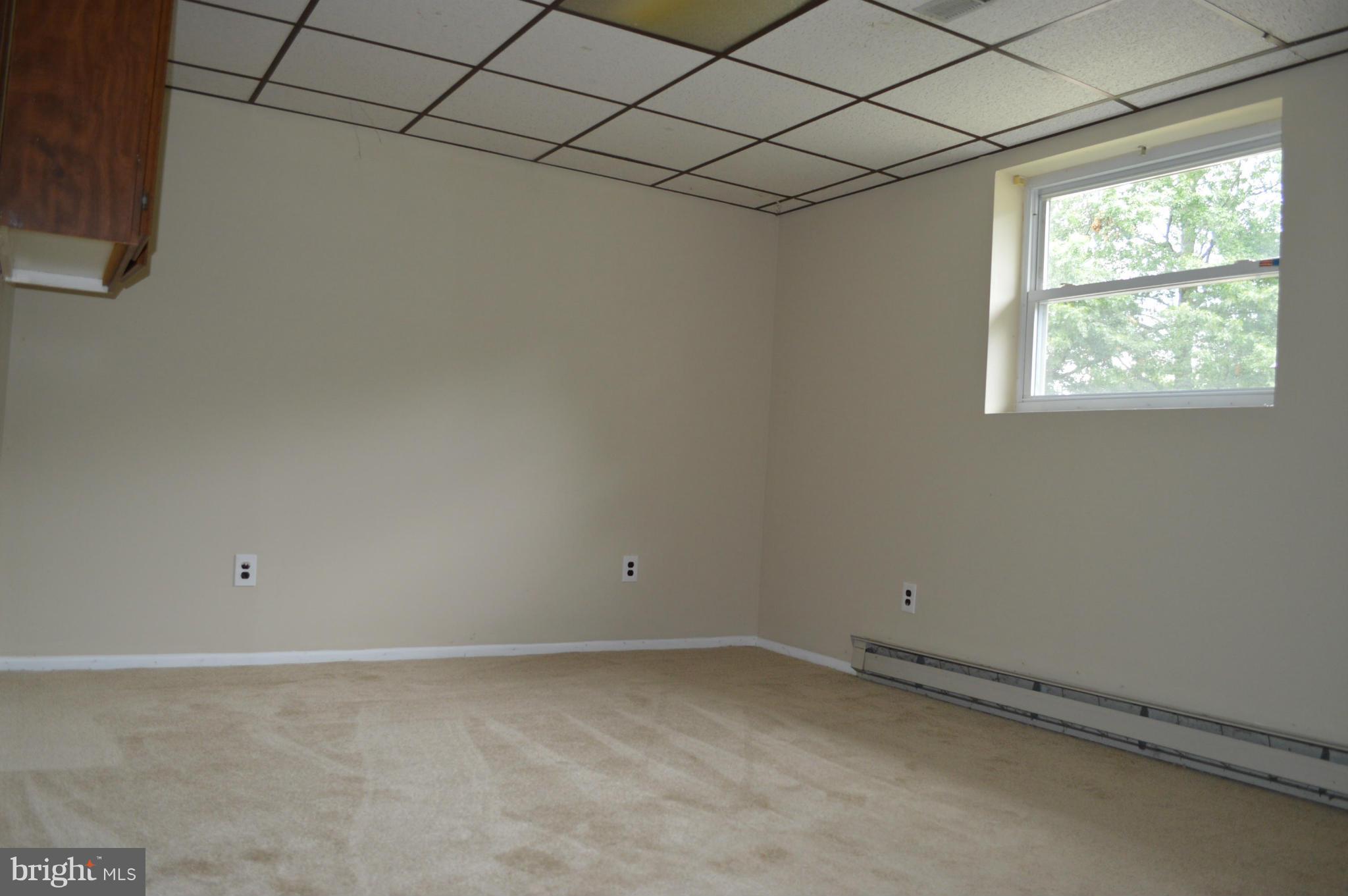 8604 Cottington Road Baltimore, MD 21236 - Photo 14 of 22 Basement offers a 3rd bedroom space