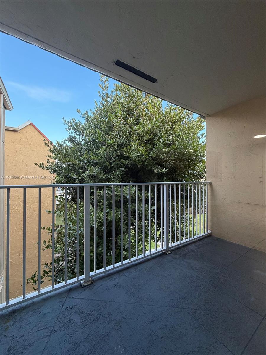 5112 Northwest 79th Avenue, Unit 304 Doral, FL 33166 - Photo 14 of 15 a view of a balcony