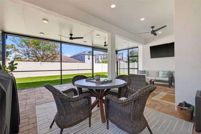 a view of a dining room with furniture window and outside view