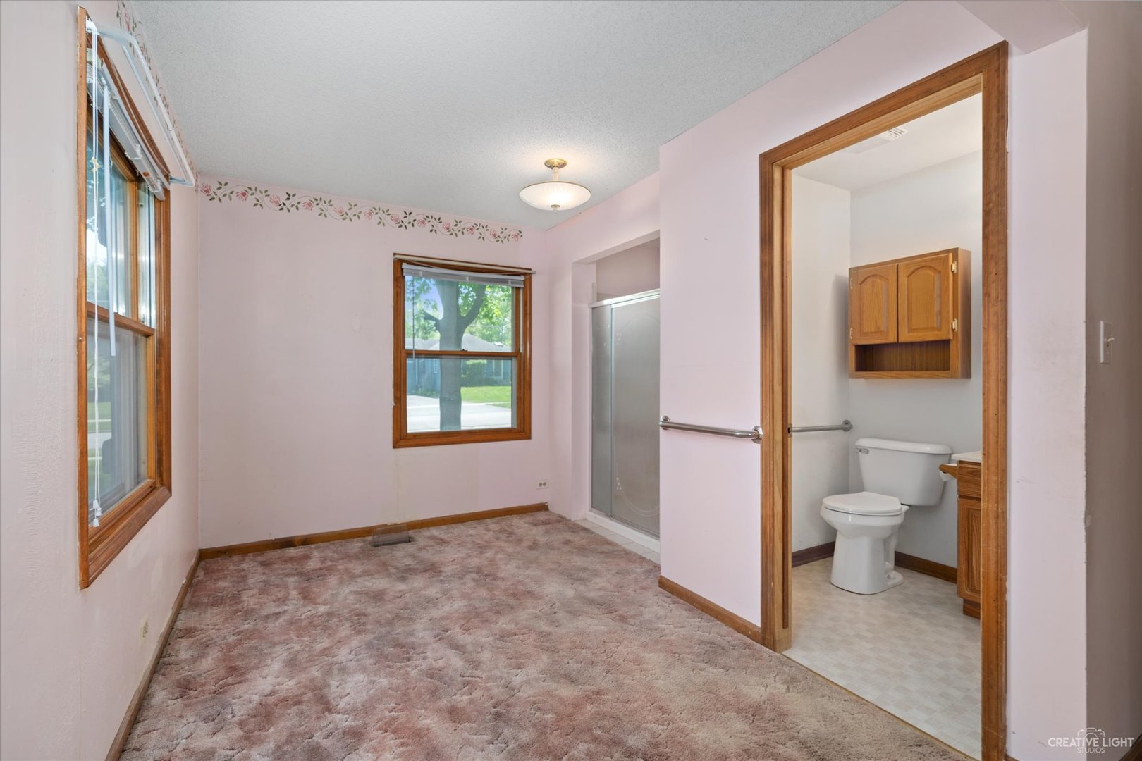 28W678 Warrenville Road Warrenville, IL 60555 - Photo 11 of 21 a bathroom with a toilet