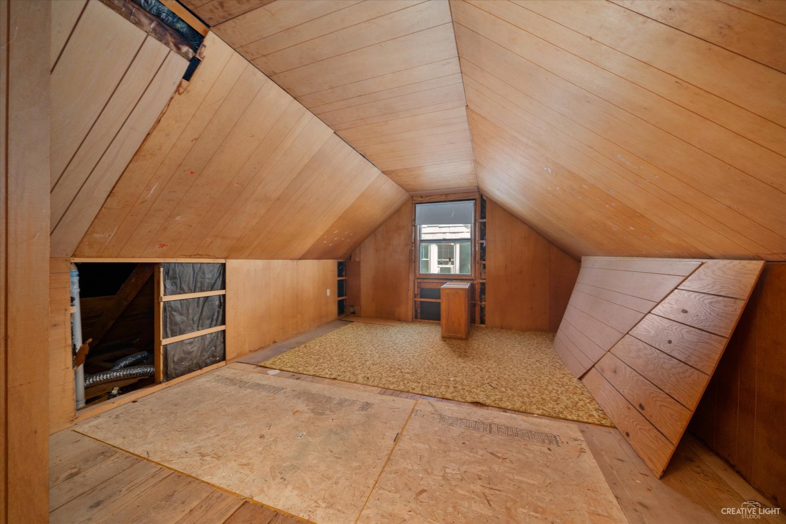 28W678 Warrenville Road Warrenville, IL 60555 - Photo 13 of 21 a view of an empty room with closet and a window
