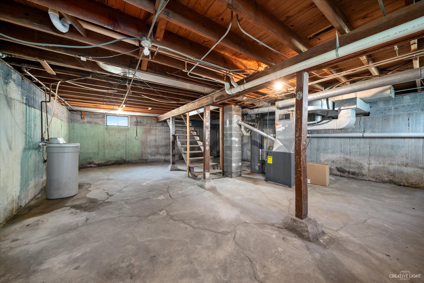 28W678 Warrenville Road Warrenville, IL 60555 - Photo 17 of 21 a view of empty room with wooden ceiling