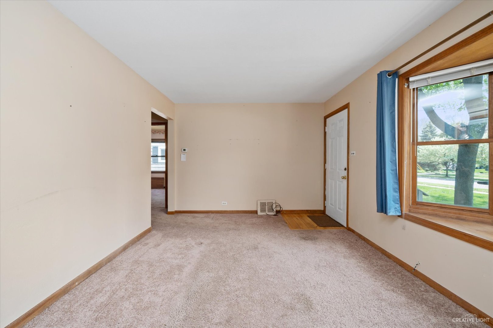 28W678 Warrenville Road Warrenville, IL 60555 - Photo 4 of 21 an empty room with windows