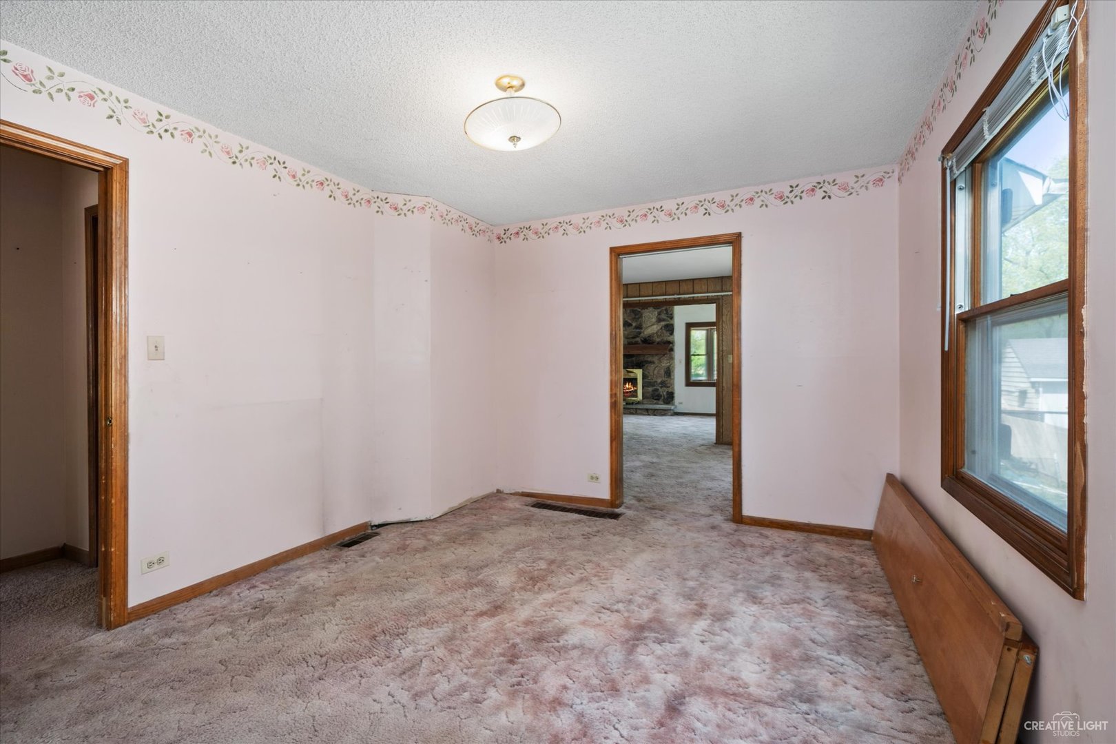 28W678 Warrenville Road Warrenville, IL 60555 - Photo 10 of 21 a view of an empty room with glass door