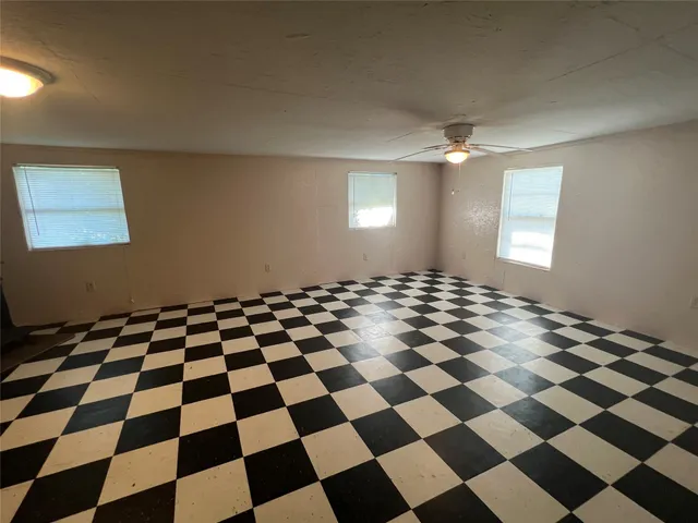 a black and white checkered floor with a black white checkered floor