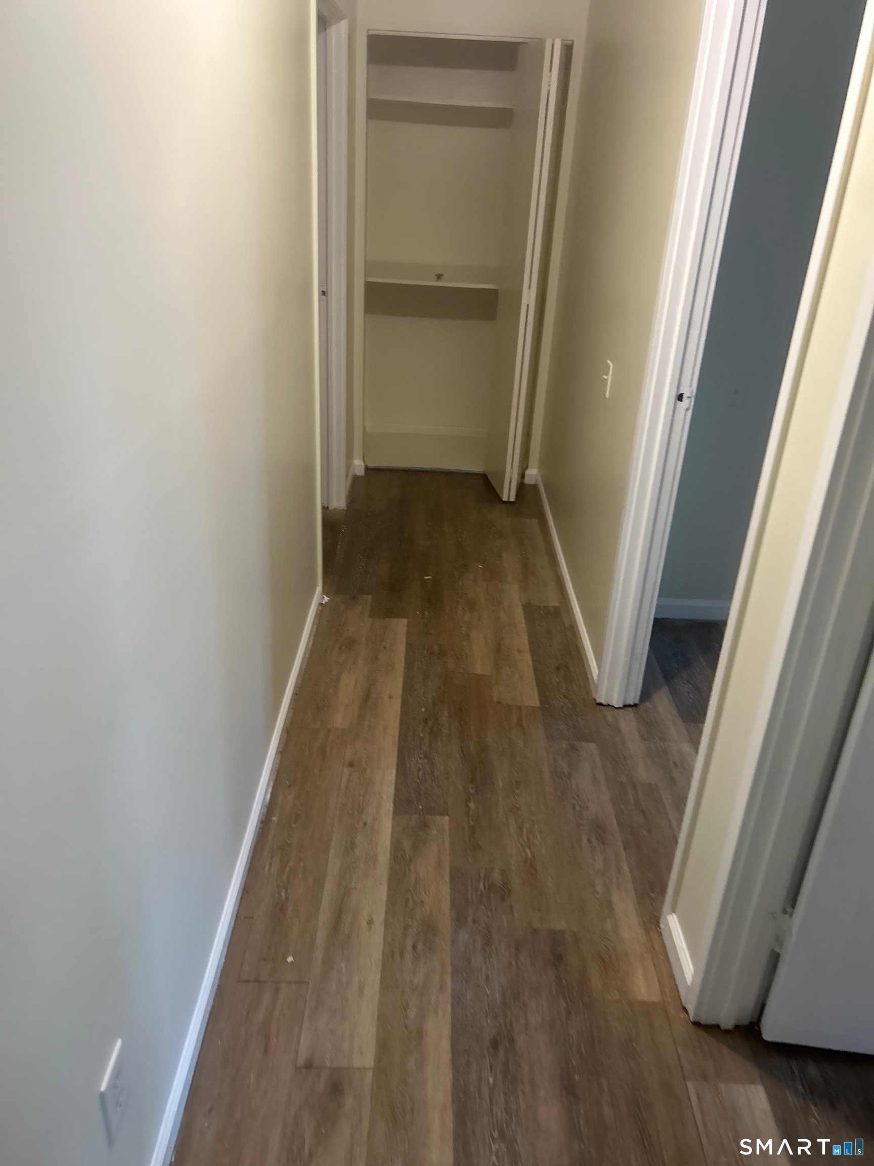30 Stevens Street, Unit 105 Bridgeport, CT 06606 - Photo 5 of 8 a view of a hallway