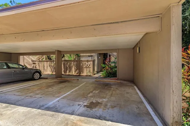 a view of parking area and car parked