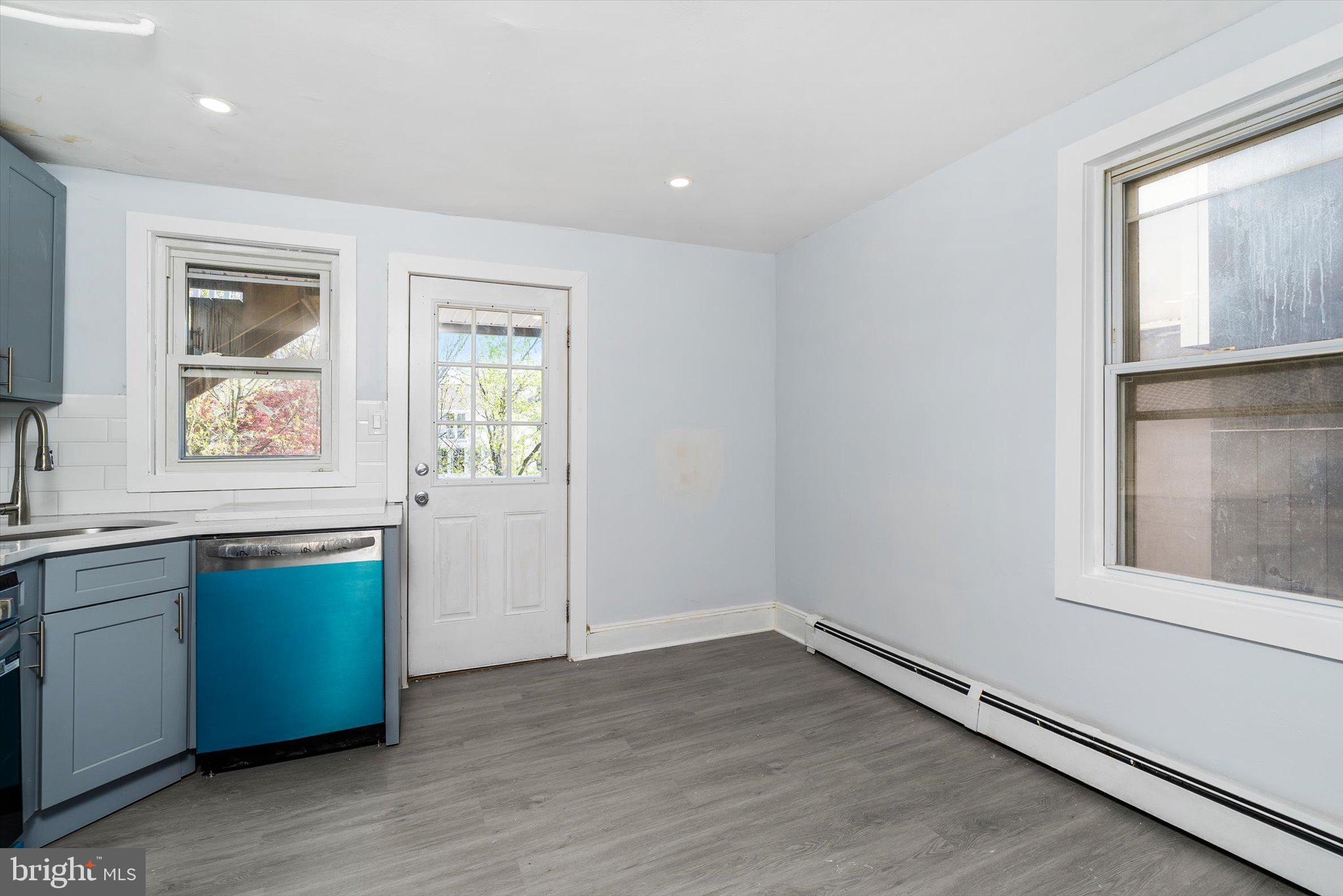 10 Lytle Street, Unit 4 Princeton, NJ 08542 - Photo 13 of 17 a view of wooden floor and windows in a room