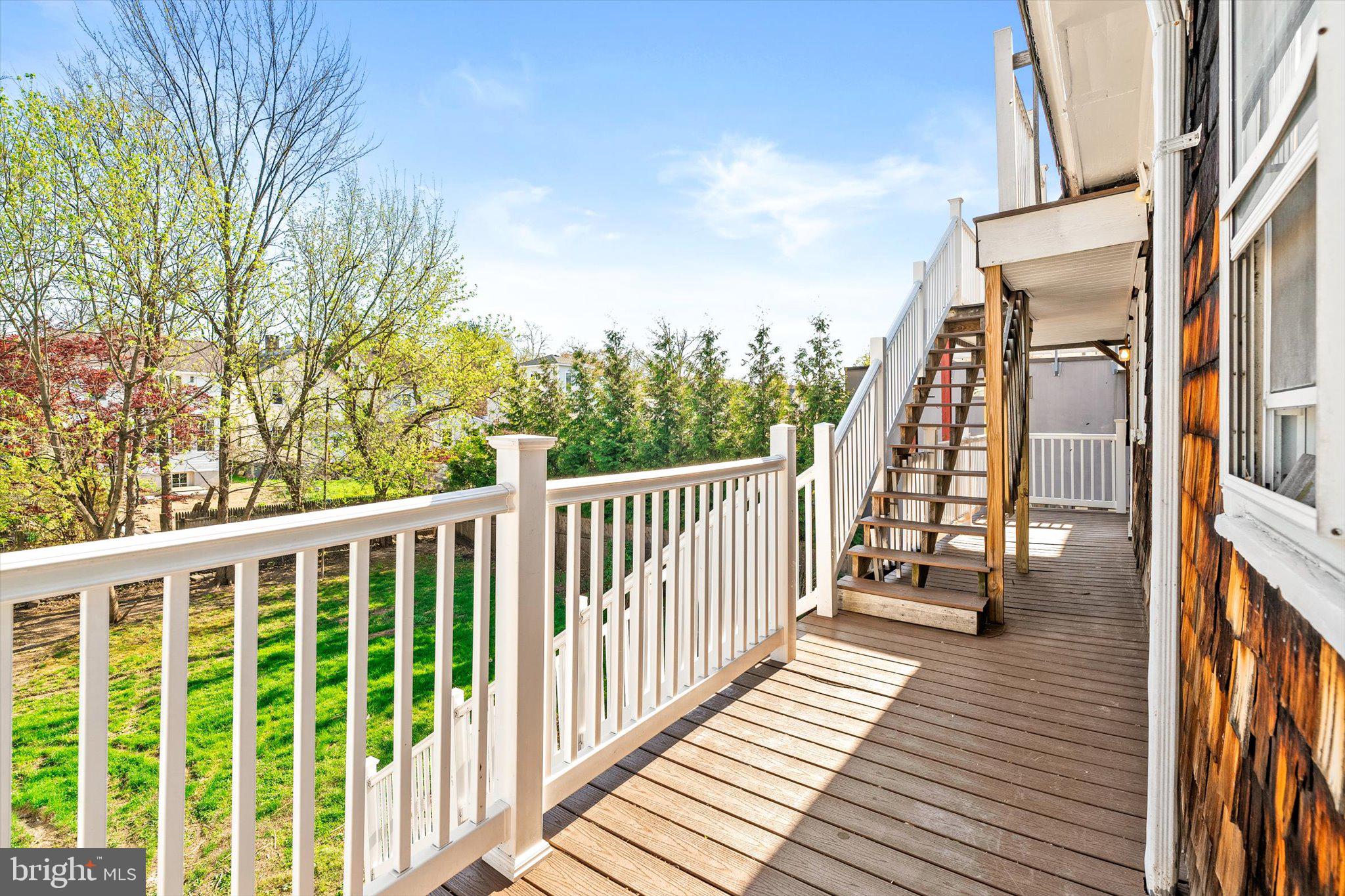 10 Lytle Street, Unit 4 Princeton, NJ 08542 - Photo 17 of 17 a view of a balcony with wooden floor and fence