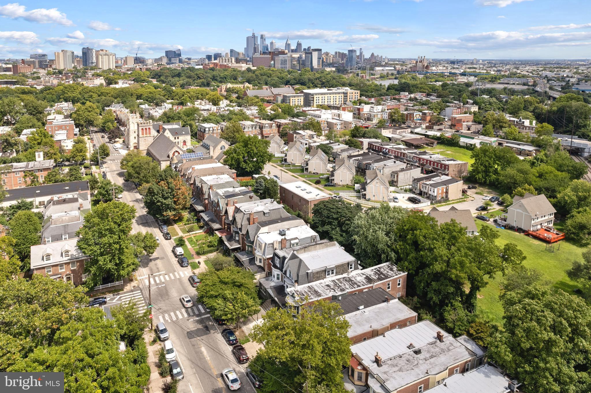 4804 Kingsessing Avenue Philadelphia, PA 19143 - Photo 3 of 17 an aerial view of residential building with green space