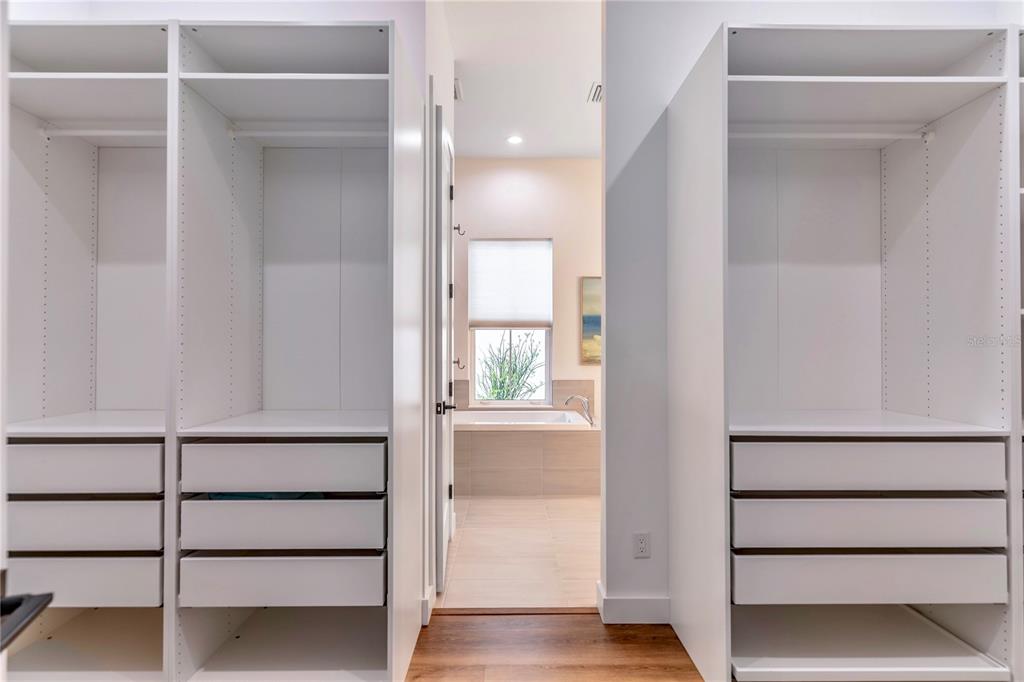31035 Pasco Road San Antonio, FL 33576 - Photo 26 of 80 a view of walk in closet with empty racks