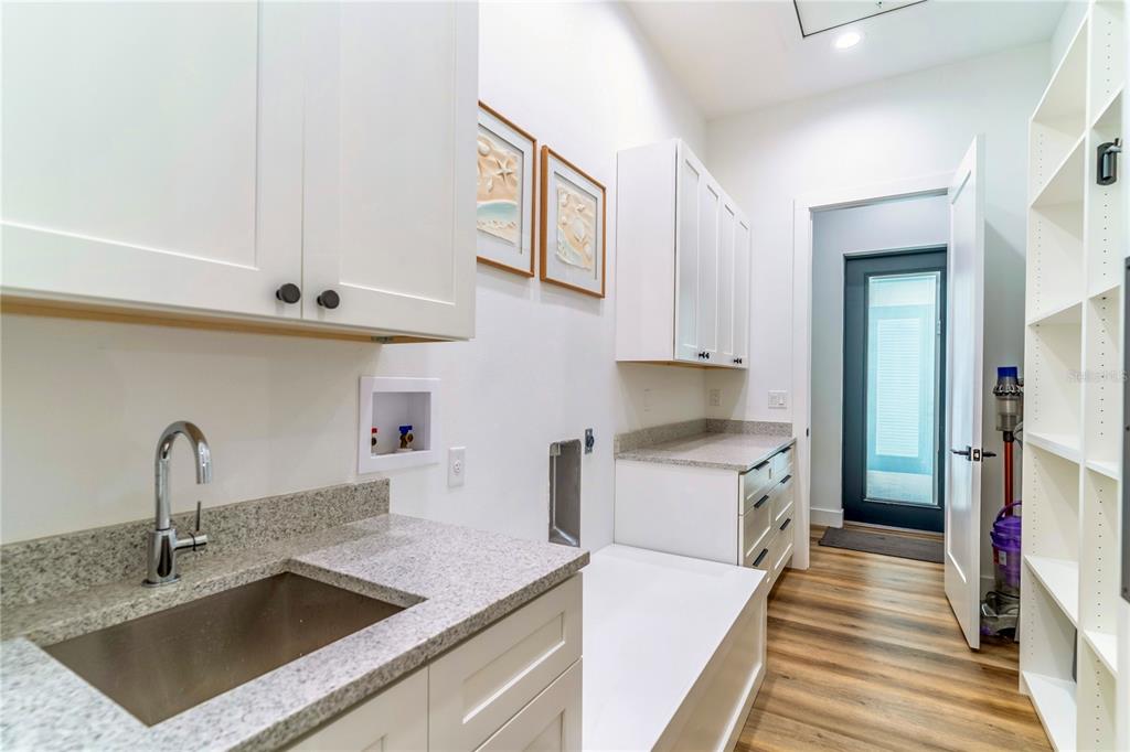 31035 Pasco Road San Antonio, FL 33576 - Photo 37 of 80 a kitchen with a sink stove and refrigerator