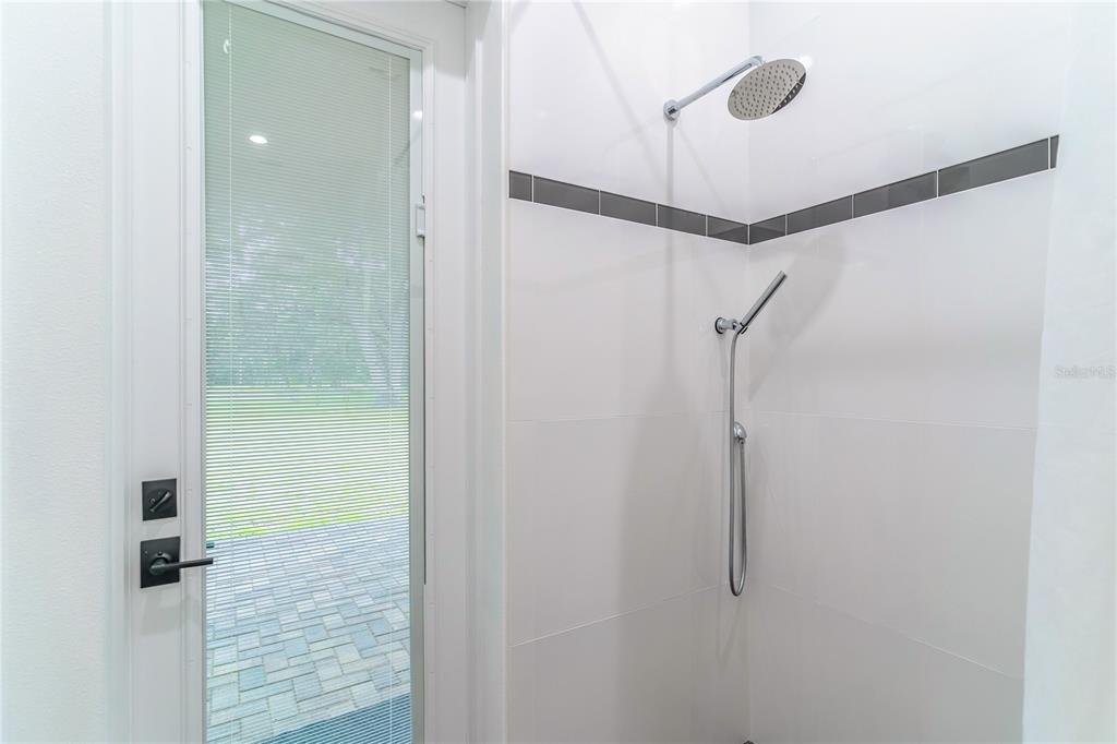 31035 Pasco Road San Antonio, FL 33576 - Photo 40 of 80 a bathroom with a shower