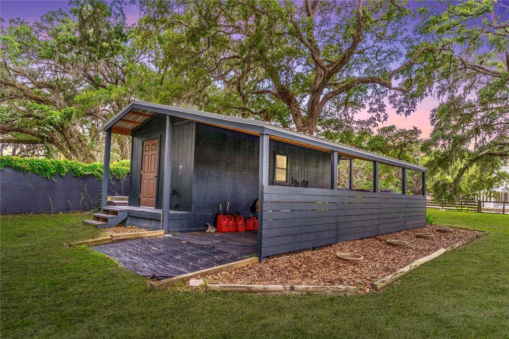 31035 Pasco Road San Antonio, FL 33576 - Photo 70 of 80 a front view of a house with a yard