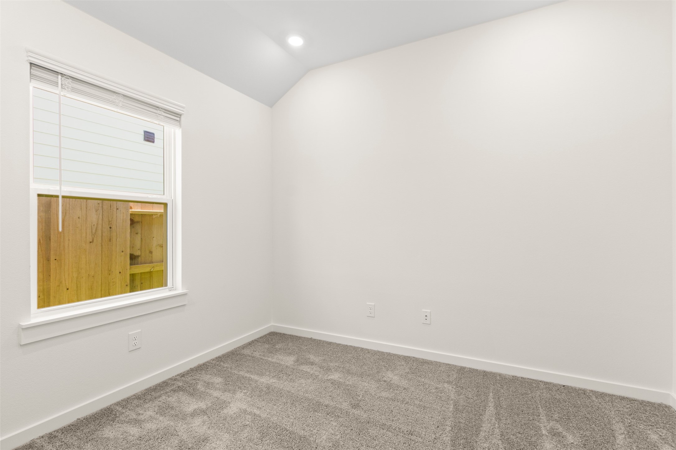 6643 Escondido Drive Rosharon, TX 77583 - Photo 15 of 25 an empty room with a window