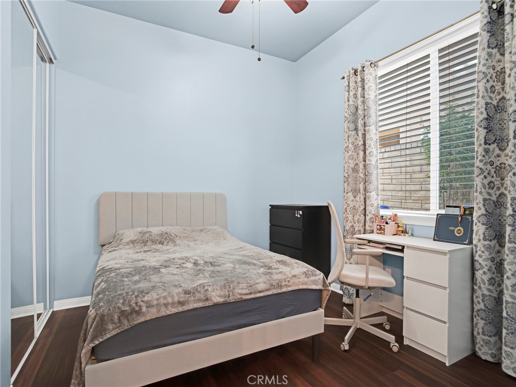21103 Cross Creek Drive Saugus, CA 91350 - Photo 18 of 41 a bedroom with a bed and a desk