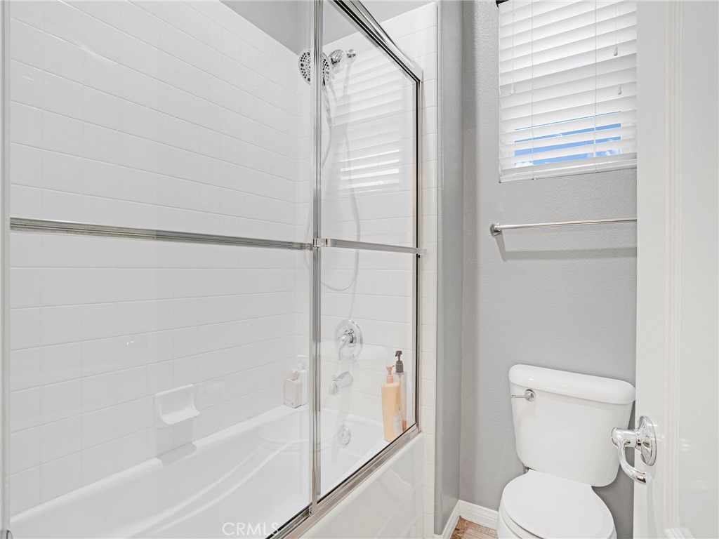 21103 Cross Creek Drive Saugus, CA 91350 - Photo 29 of 41 a bathroom with a toilet and a shower