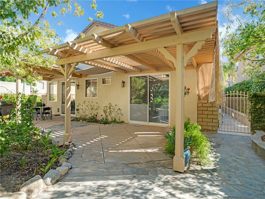 21103 Cross Creek Drive Saugus, CA 91350 - Photo 35 of 41 a front view of a house with a yard