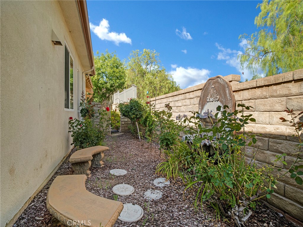 21103 Cross Creek Drive Saugus, CA 91350 - Photo 38 of 41 a backyard of a house with lots of green space