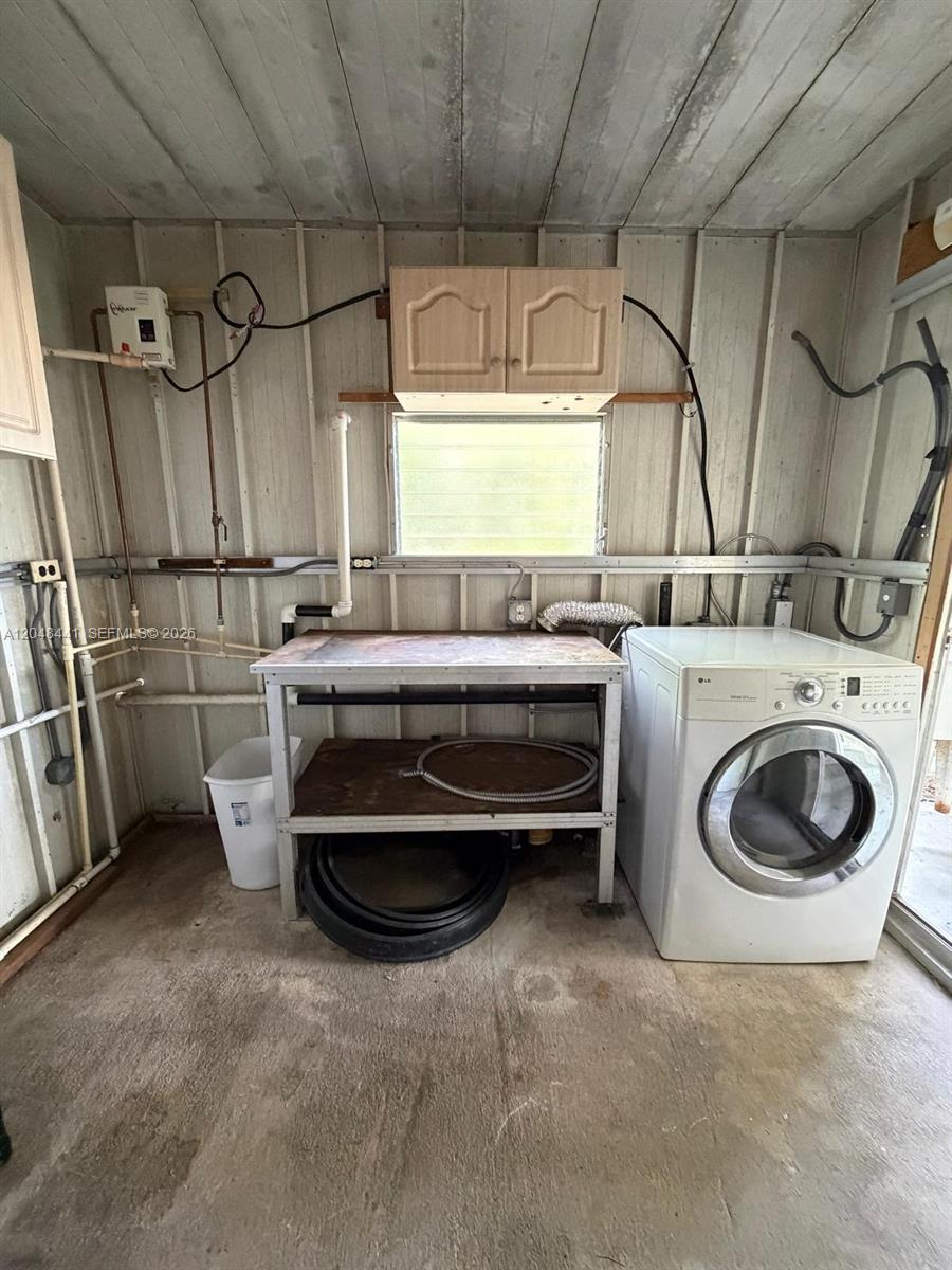 5331 Southwest 35th Street Davie, FL 33314 - Photo 27 of 31 a utility room with dryer and washer