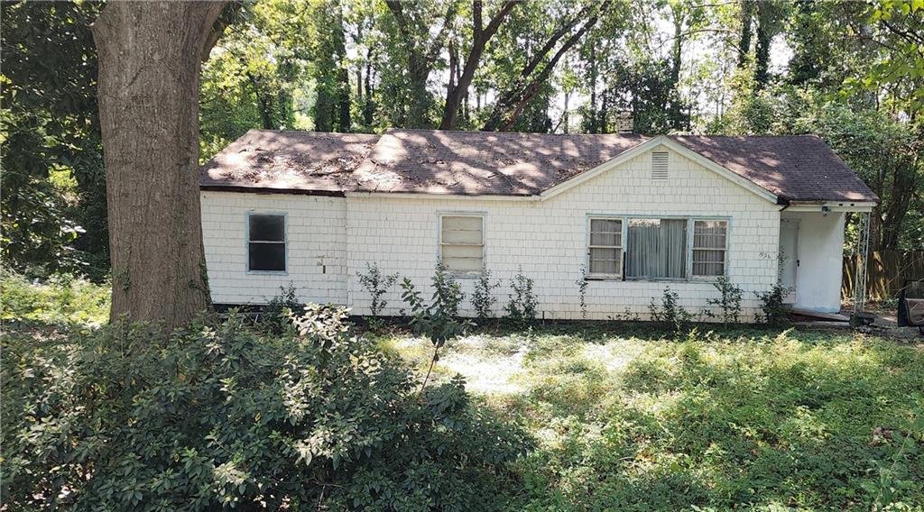 a house that has a lot of plants in it