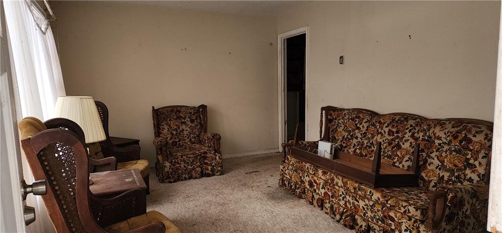 1926 Sumter Street Northwest Atlanta, GA 30318 - Photo 4 of 14 a living room with furniture
