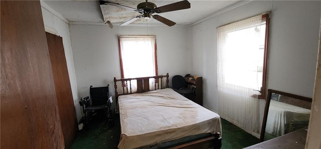 1926 Sumter Street Northwest Atlanta, GA 30318 - Photo 7 of 14 a view of a livingroom with furniture window and wooden floor