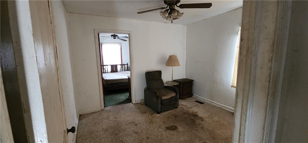 1926 Sumter Street Northwest Atlanta, GA 30318 - Photo 8 of 14 a living room with furniture and a window