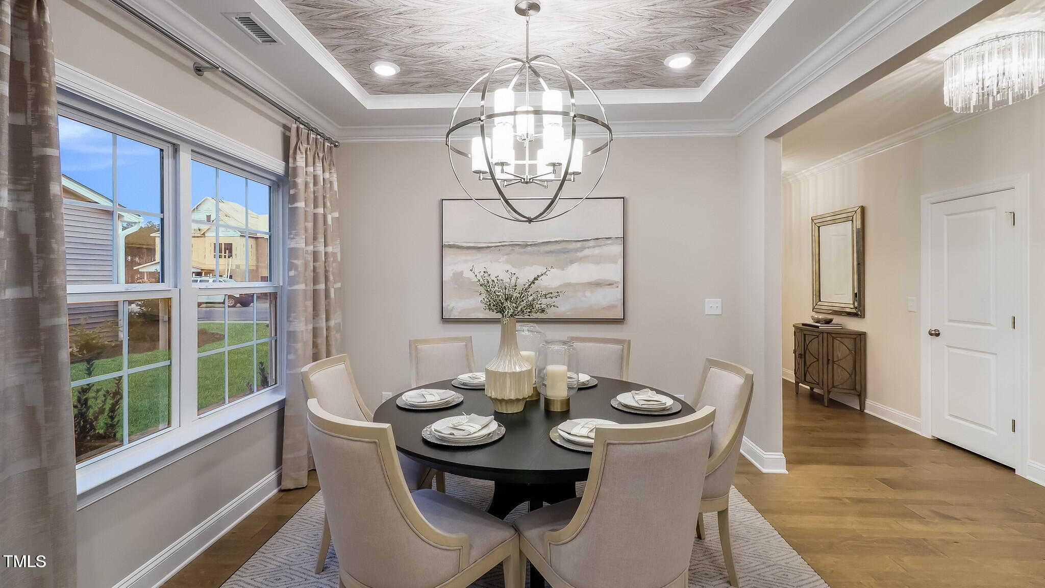 1011 Constellation Circle Durham, NC 27703 - Photo 11 of 25 a view of a dining room with furniture window and wooden floor
