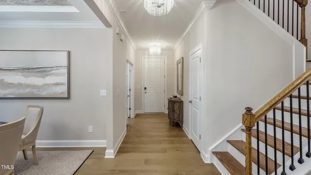 a view of a hallway with seating area