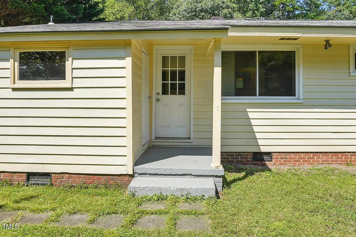 912 Dixie Trail Raleigh, NC 27607 - Photo 23 of 28 a view of a house with a window