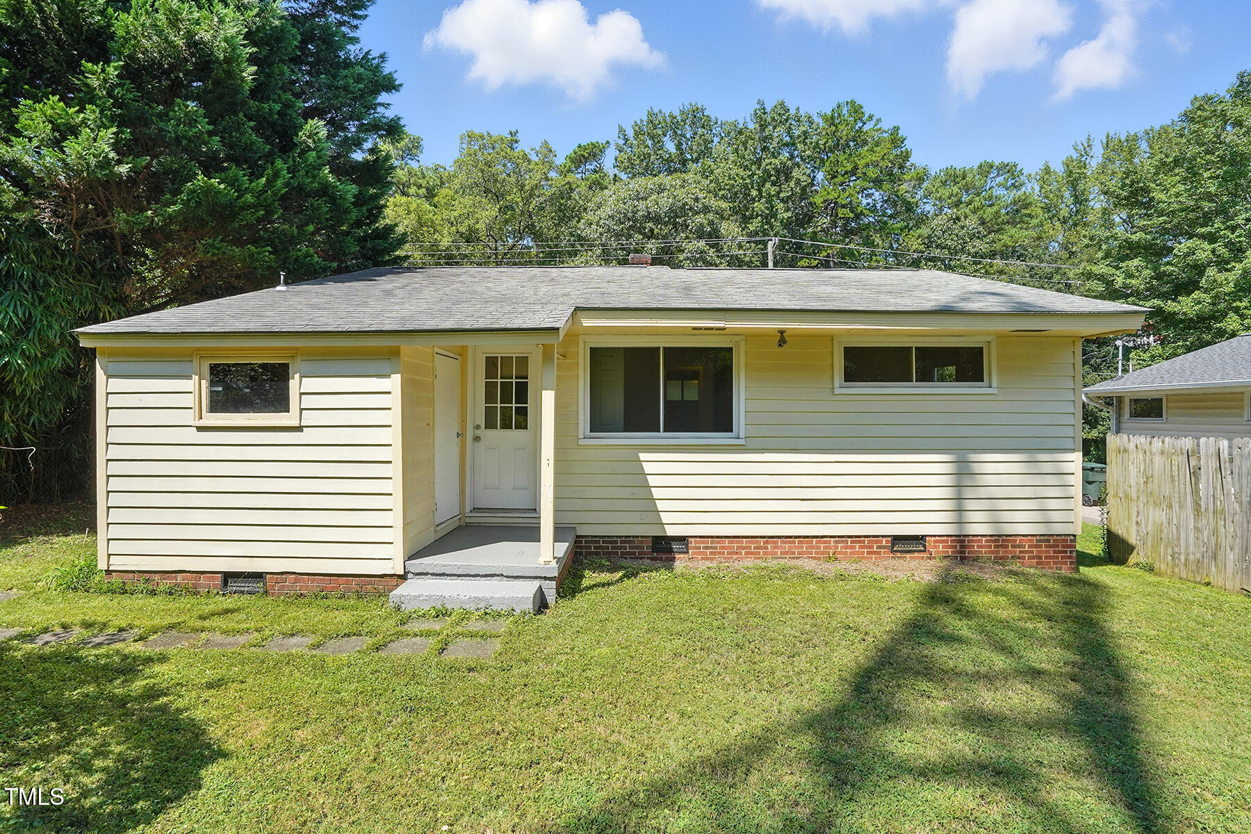 912 Dixie Trail Raleigh, NC 27607 - Photo 24 of 27 a view of a house with a yard